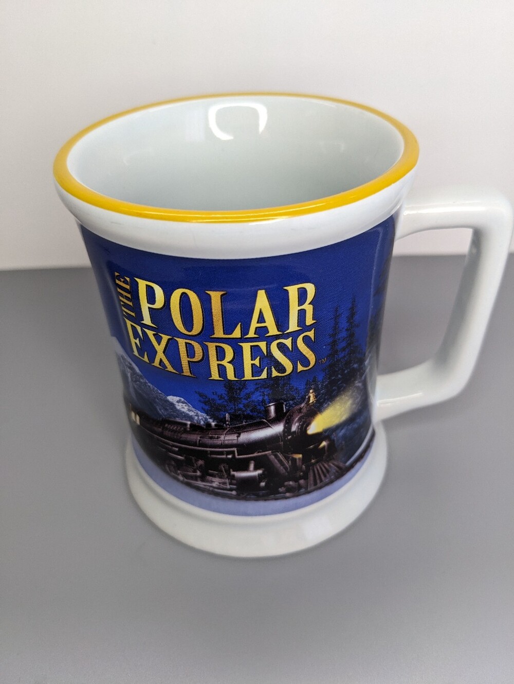 Polar Express Raised Relief Ceramic Mug 2018 Warner Bros Blue Train Holiday